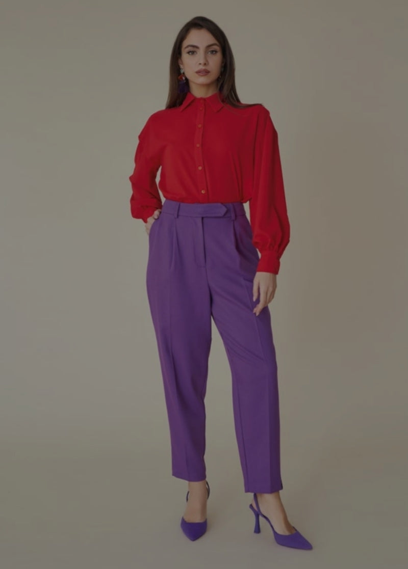 Pantaloni scintillanti viola